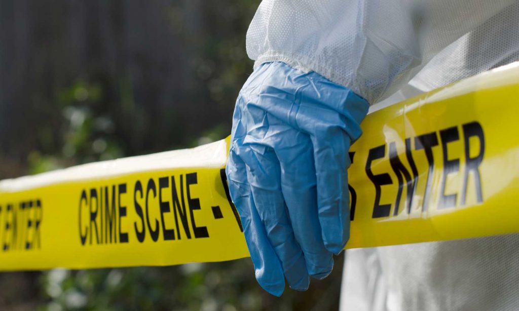 Forensic investigator working at a crime scene